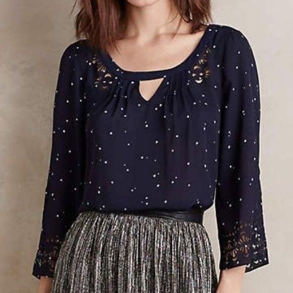 Anthropologie Maeve blouse navy blue white stars elegant laser cutout details
